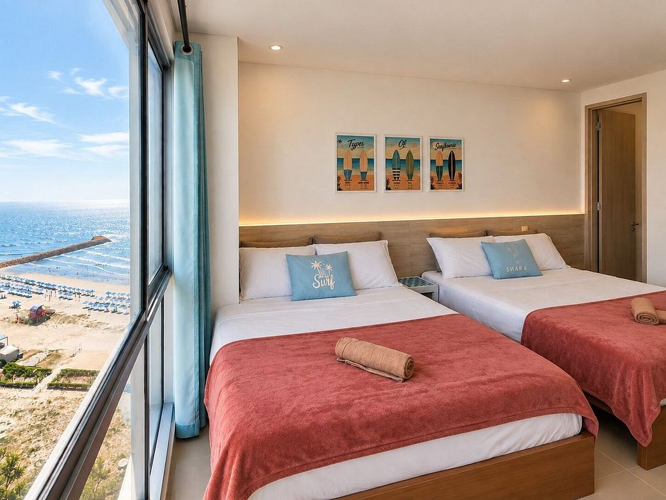 Dormitorio con dos camas dobles en Murano Elite 1204